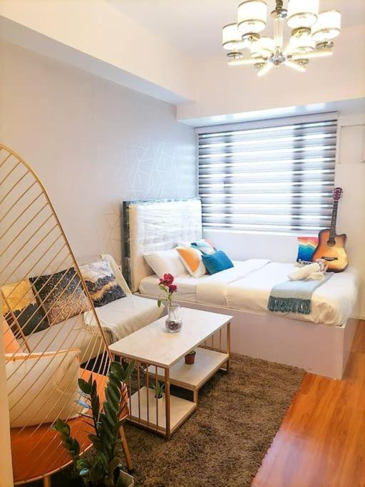 كويزون سيتي Cozy Studio Unit At Sun Residences المظهر الخارجي الصورة