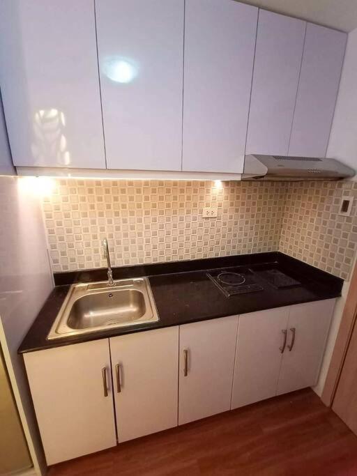 كويزون سيتي Cozy Studio Unit At Sun Residences المظهر الخارجي الصورة