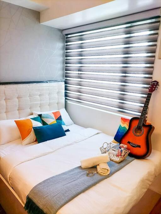 كويزون سيتي Cozy Studio Unit At Sun Residences المظهر الخارجي الصورة
