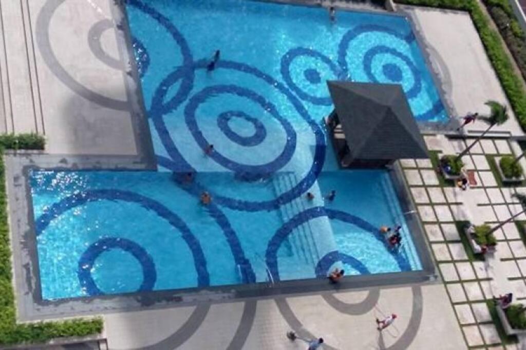 كويزون سيتي Cozy Studio Unit At Sun Residences المظهر الخارجي الصورة