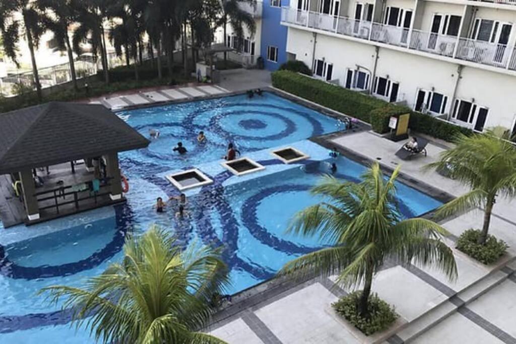 كويزون سيتي Cozy Studio Unit At Sun Residences المظهر الخارجي الصورة